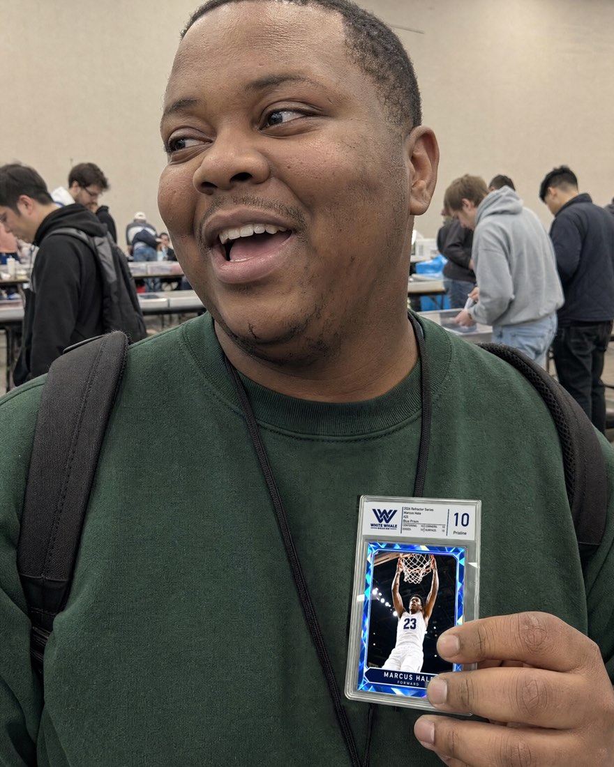 Customer holding a graded card